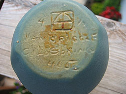 1907-1912 mark with finisher numbers flanking the AA logo