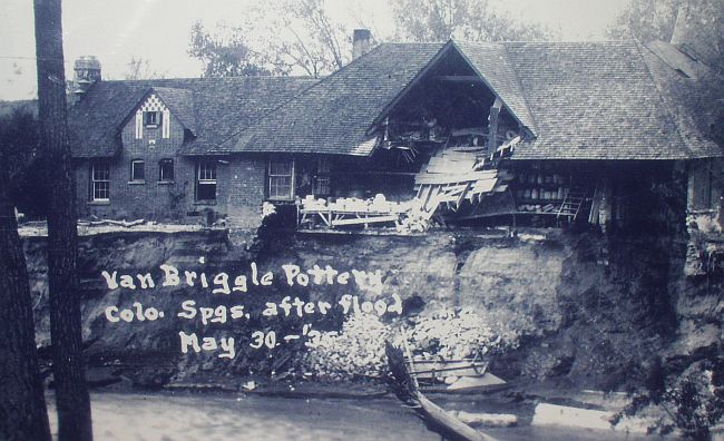 Photo from May 30, 1935 after Fountain Creek flood — part of building collapsed with pottery molds