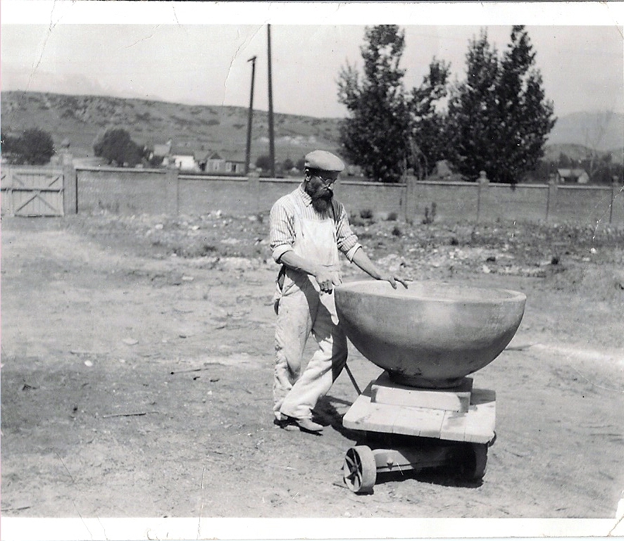 Ambrose Schlegel with huge urn for a Pueblo hotel, circa 1915