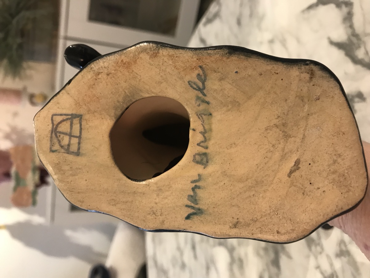 Bottom mark of late commercial Van Briggle rearing horse figurine showing squared AA monogram and cursive Van Briggle on buff clay