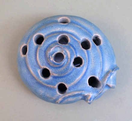 Van Briggle snail flower frog — natural snail form with matte glaze